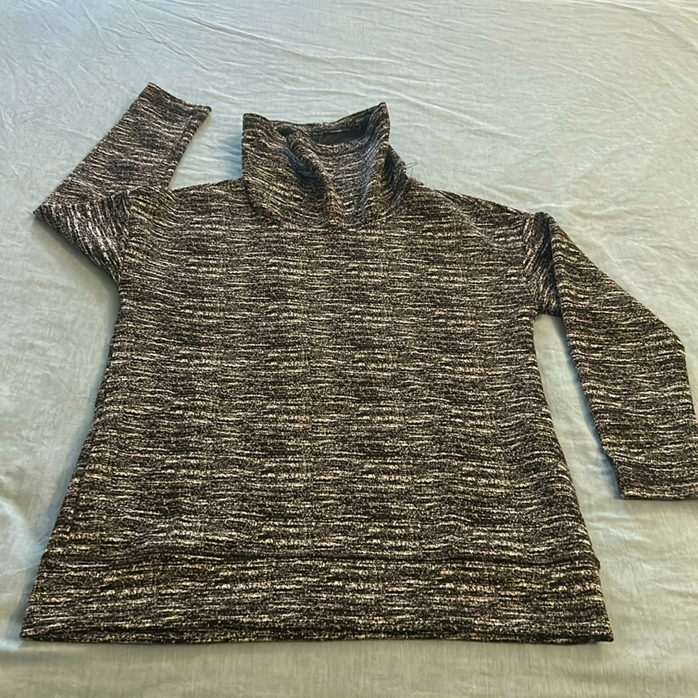 RBX Women’s size M long sleeve sweater with pockets. Width 21” and length 26”